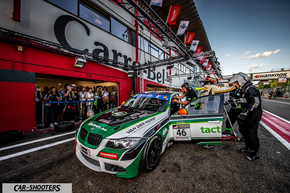 front three-quarter, white with green and black in pit lane during a race