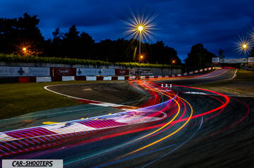detail, on a race track at night