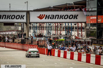 rear view, white on a race track