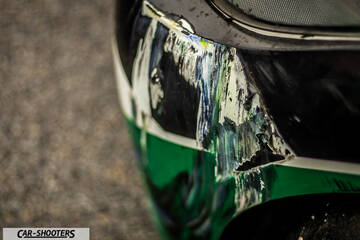 detail, headlight damage close-up
