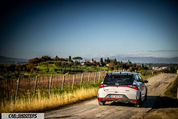 Hyundai i2N – rear three-quarter, white on a country road