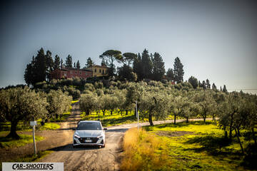 Hyundai i2N – front three-quarter, white on a country road