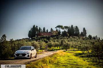 Hyundai i2N – front three-quarter, white on a country road