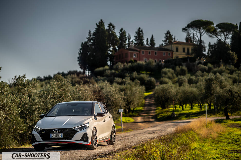 Hyundai i2N – front three-quarter, white on a country road
