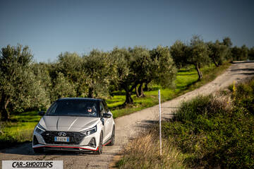 Hyundai i2N – front three-quarter, white on a country road