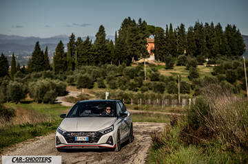 Hyundai i2N – front three-quarter, white on a country road