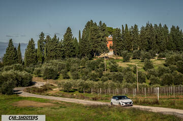Hyundai i2N – front three-quarter, white on a country road