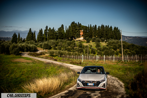 Hyundai i2N – front three-quarter, silver on a country road