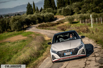 Hyundai i2N – front three-quarter, white on a country road