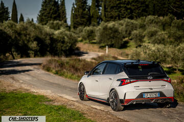 Hyundai i2N – rear three-quarter, white on a country road