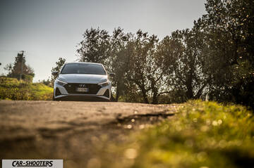 Hyundai i2N – front three-quarter, white on a country road