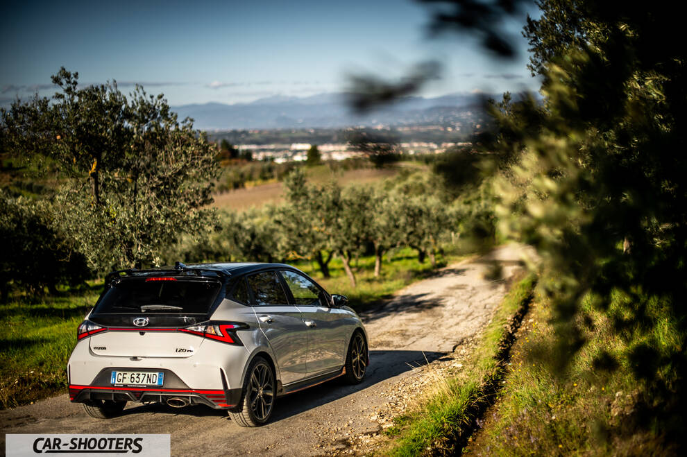 Hyundai i2N – rear three-quarter, white on a country road