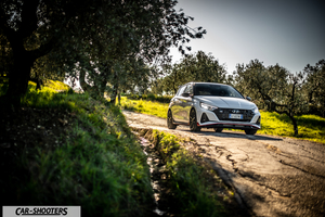 Hyundai i2N – front three-quarter, white on a country road