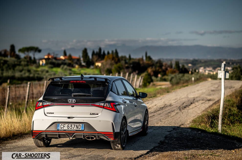 Hyundai i2N – rear three-quarter, white on a country road