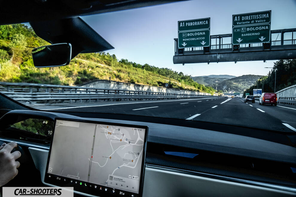 Tesla Model S Plaid – interior, driving on a highway