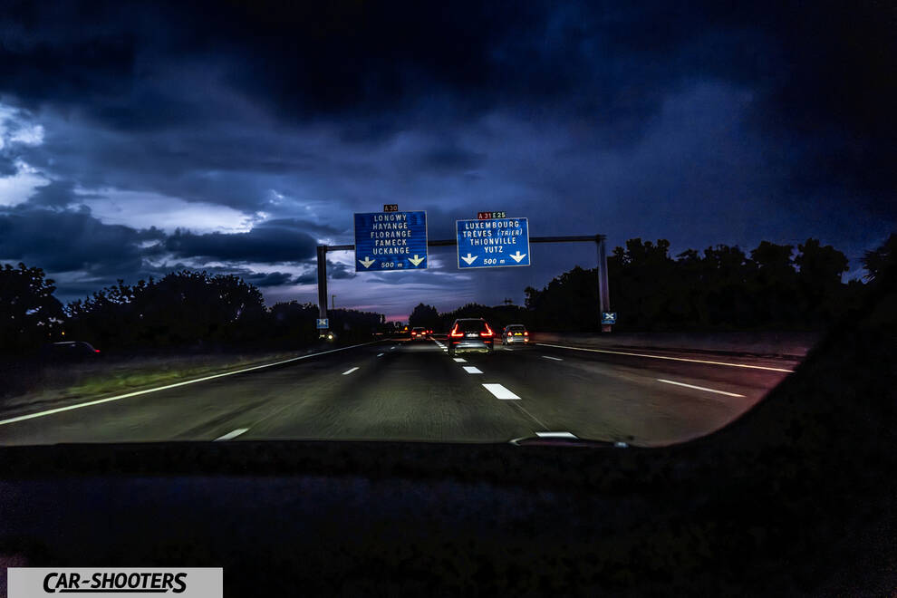 Tesla Model S Plaid – interior, view from inside a car driving on a highway at night