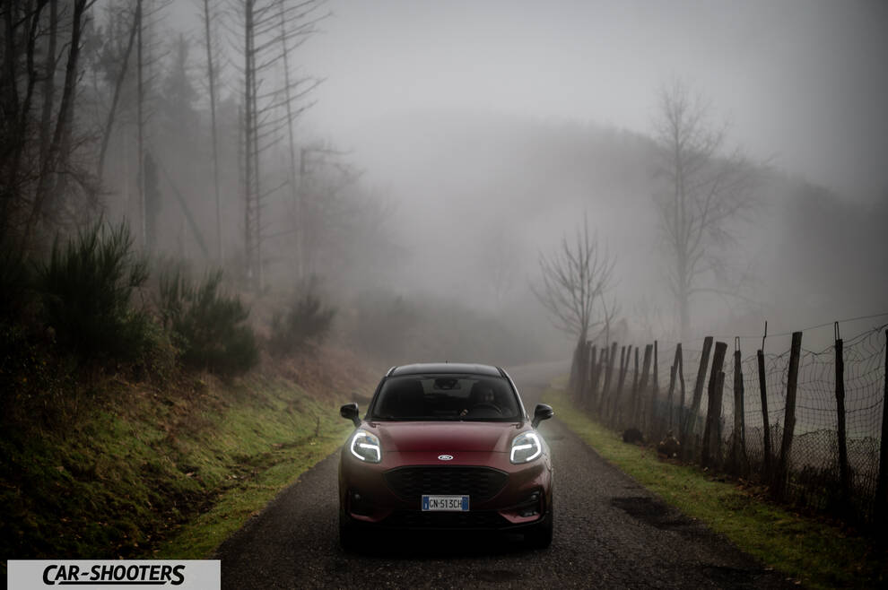 Ford Puma STLine – front three-quarter, dark red on a country road