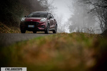 Ford Puma STLine – front three-quarter, dark red on a country road