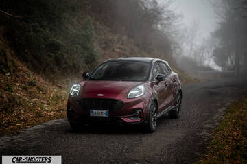 Ford Puma STLine – front three-quarter, dark red on a country road