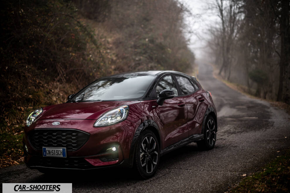 Ford Puma STLine – front three-quarter, dark red on a country road