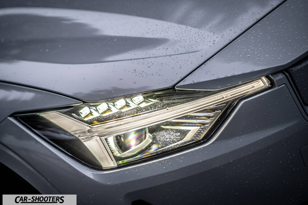 Polestar 2 – detail, headlight close-up with raindrops
