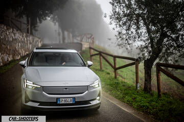 Polestar 2 – front three-quarter, silver on a country road