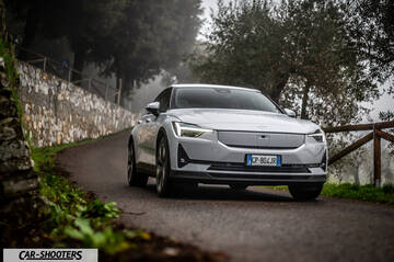 Polestar 2 – front three-quarter, white on a country road