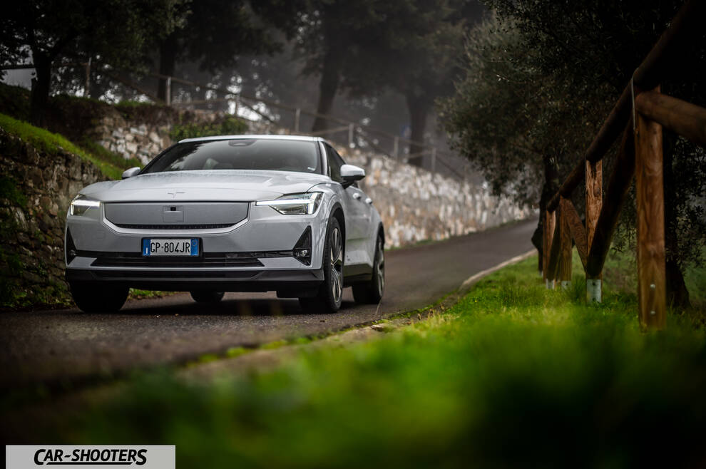Polestar 2 – front three-quarter, white on a country road