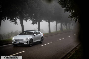 Polestar 2 – front three-quarter, silver on a foggy tree lined road