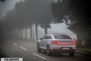 Polestar 2 – rear three-quarter, white on a foggy road