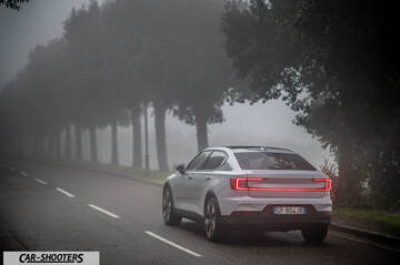 Polestar 2 – rear three-quarter, white on a foggy road