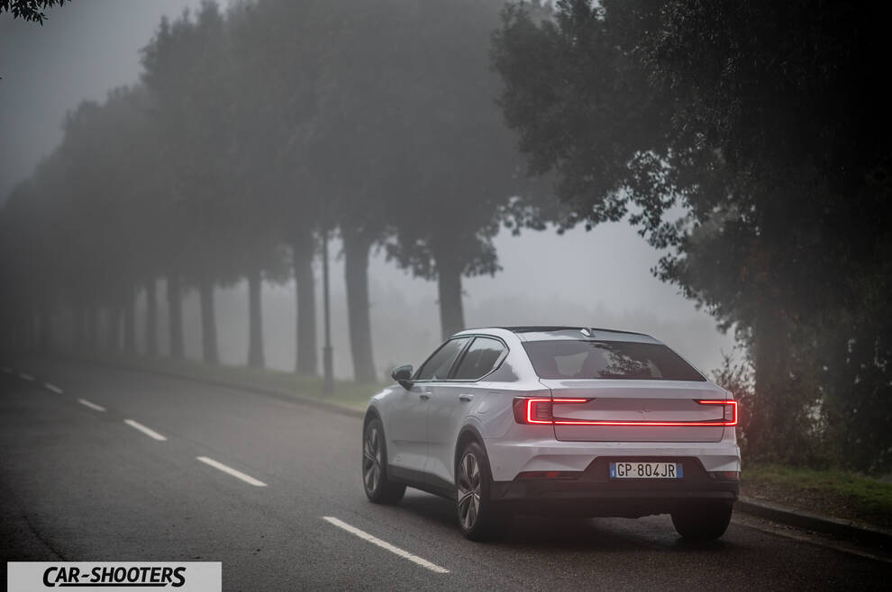 Polestar 2 – rear three-quarter, white on a foggy road