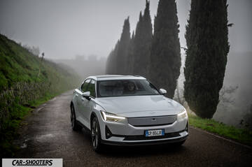 Polestar 2 – front three-quarter, white on a country road