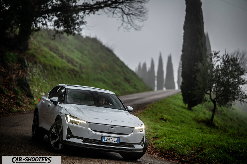 Polestar 2 – front three-quarter, white on a country road