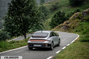 Hyundai Ioniq 6 – rear view, silver on a winding mountain road