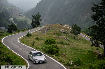 Hyundai Ioniq 6 – front three-quarter, silver on a winding mountain road