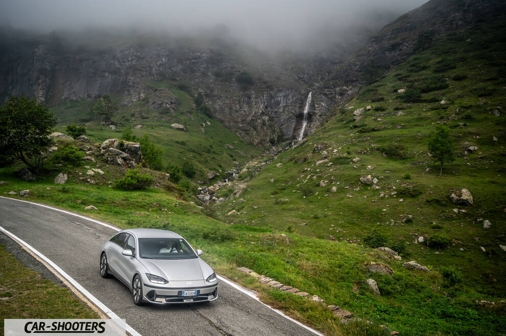 Hyundai Ioniq 6 – front three-quarter, silver on a winding mountain road