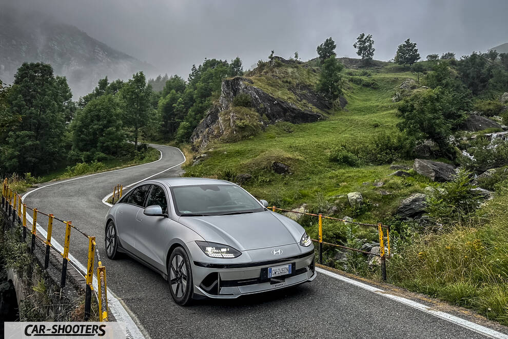 Hyundai Ioniq 6 – front three-quarter, silver on a winding mountain road