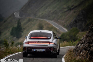 Hyundai Ioniq 6 – rear view, silver on a winding mountain road