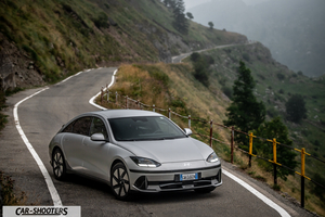 Hyundai Ioniq 6 – front three-quarter, silver on a winding mountain road