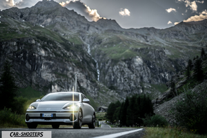 Hyundai Ioniq 6 – front three-quarter, silver against a mountain backdrop