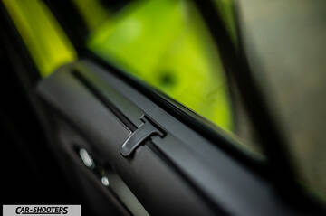 Skoda Enyaq – detail, door sunshade handle close-up