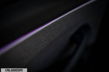 Tesla Model 3 2025 – detail, door panel trim close-up
