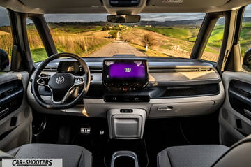 Volkswagen ID BUZZ – dashboard, view through windshield of a road
