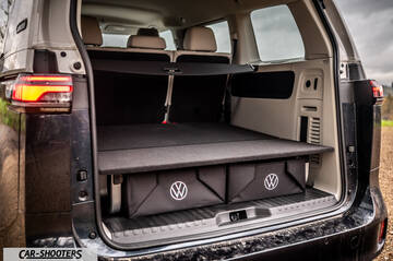 Volkswagen ID BUZZ – interior, spacious cargo area with storage boxes