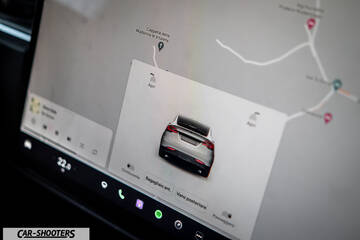 Tesla Model X – dashboard, large infotainment touchscreen displaying navigation and vehicle controls