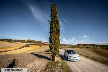 Tesla Model X – front three-quarter, white on a country road