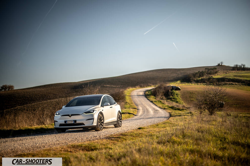 Tesla Model X – front three-quarter, white on a country road