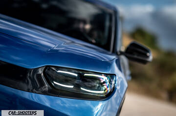 Ford Capri – front three-quarter, blue against an outdoor backdrop
