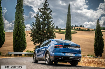 Ford Capri – rear three-quarter, blue on a country road